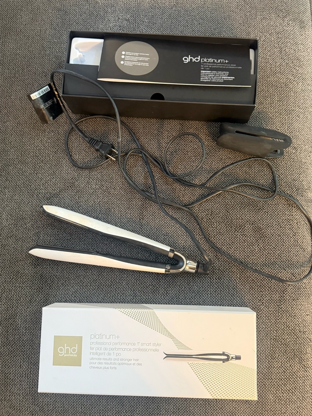 ghd silver and black flat iron with packaging